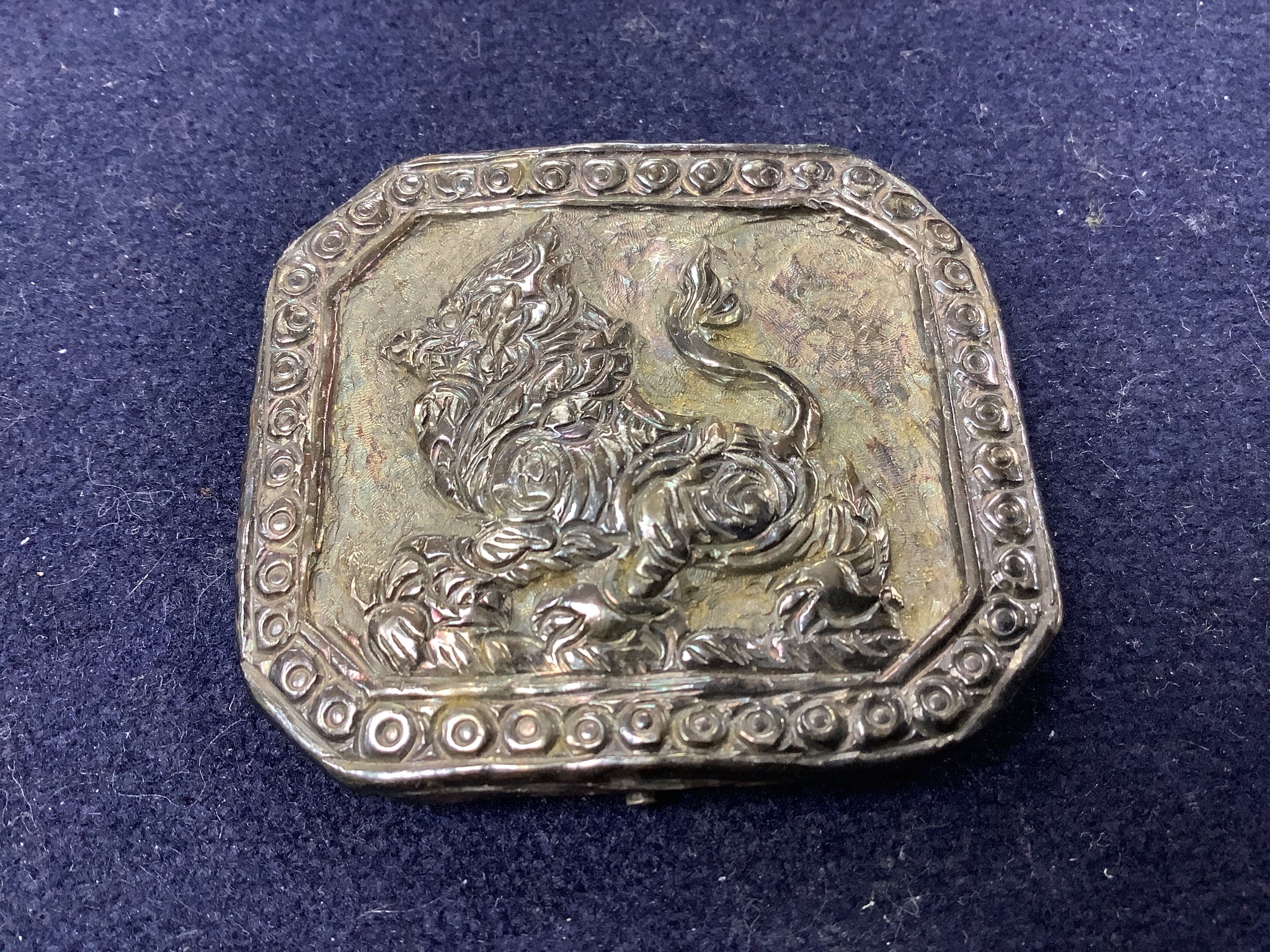 A group of Asian and other small collectables, white metal, brass, jade etc.